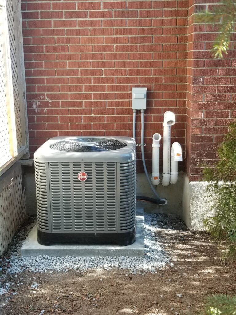 Rheem AC installed in residential home for central cooling.