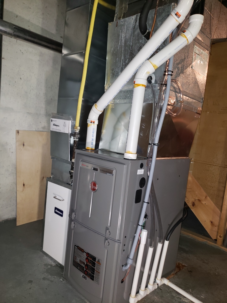 Ottawa Homeowner gas furnace installation. Rheem R98V high efficiency gas furnace.