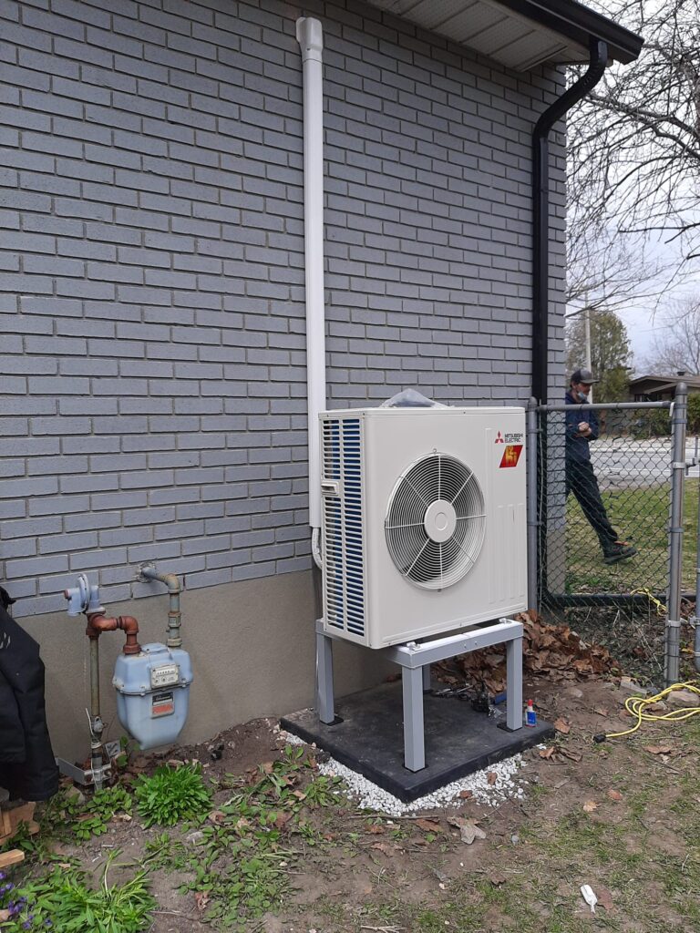 An outdoor portion of a mini split system. This popular choice is a Mitsubishi Hyper Heat product.