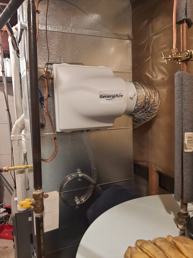 Whole home humidifier installed in Ottawa by premier home service business AirZone HVAC Services.